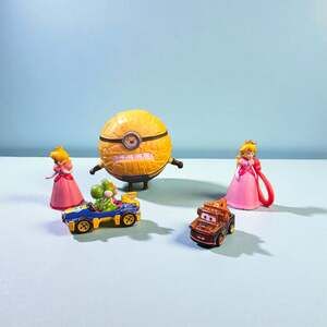 Minion, Princess Peach, Yoshi, and Mater Figures Toy Bundle